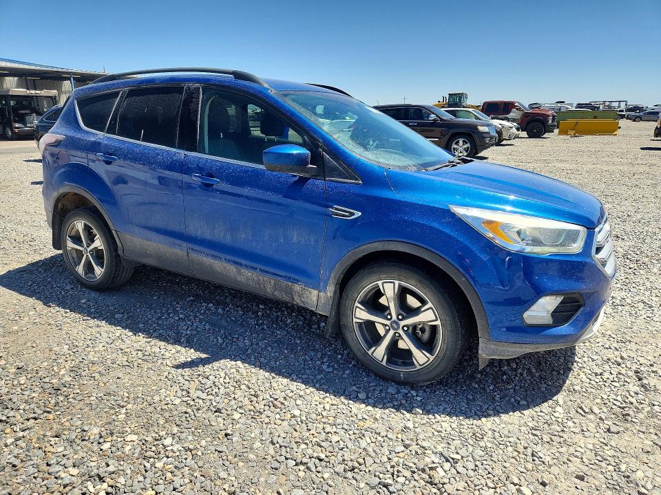 Photo 4 from auction – 2017 FORD ESCAPE with VIN 1FMCU9G92HUA17134