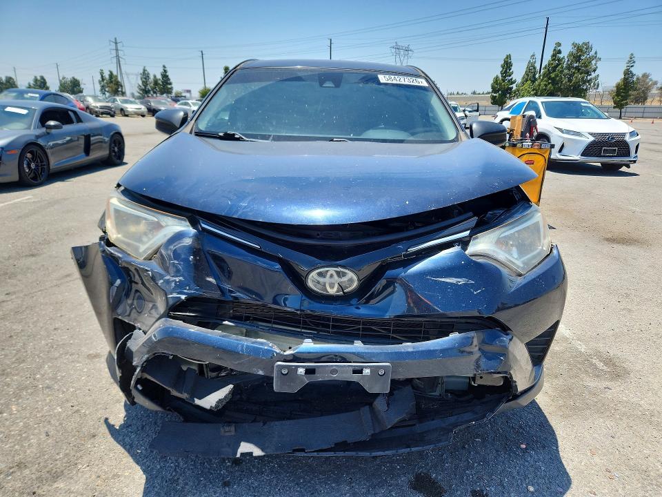 Photo 5 from auction – 2017 TOYOTA RAV4 with VIN JTMZFREV9HJ719252