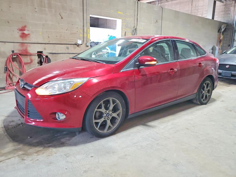 FORD FOCUS 2014 with VIN 1FADP3F28EL318452 - Photo from auction