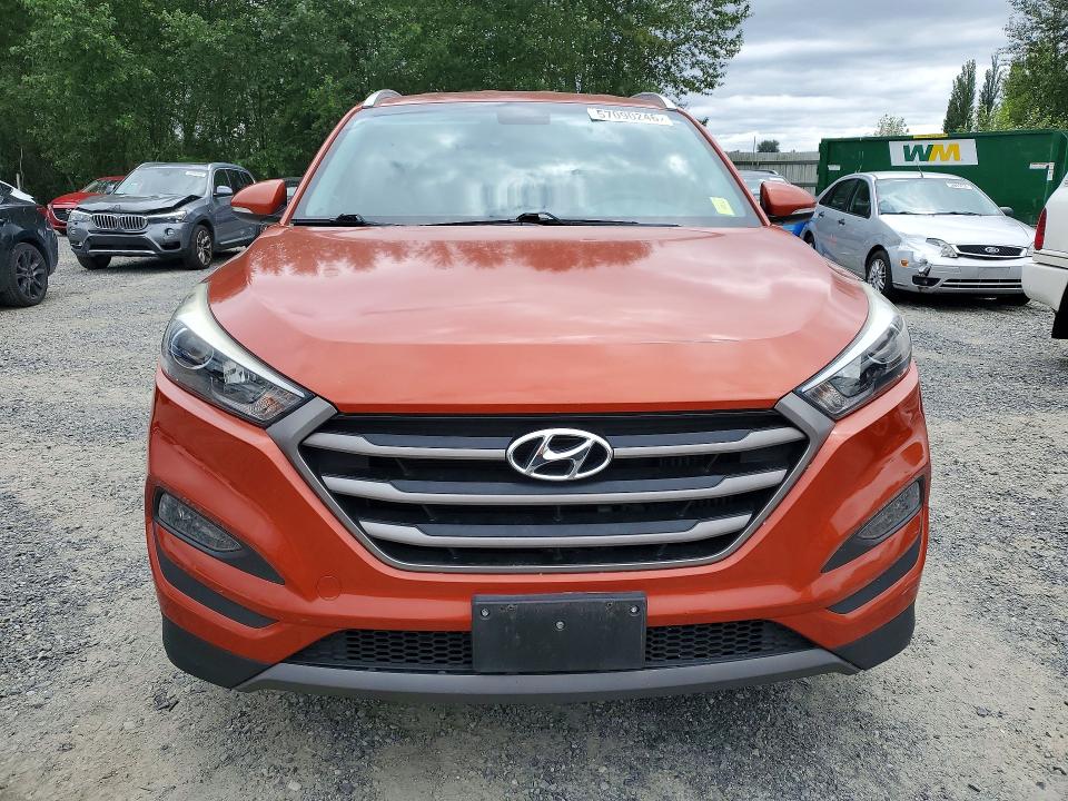 Photo 5 from auction – 2016 HYUNDAI TUCSON with VIN KM8J3CA21GU077326
