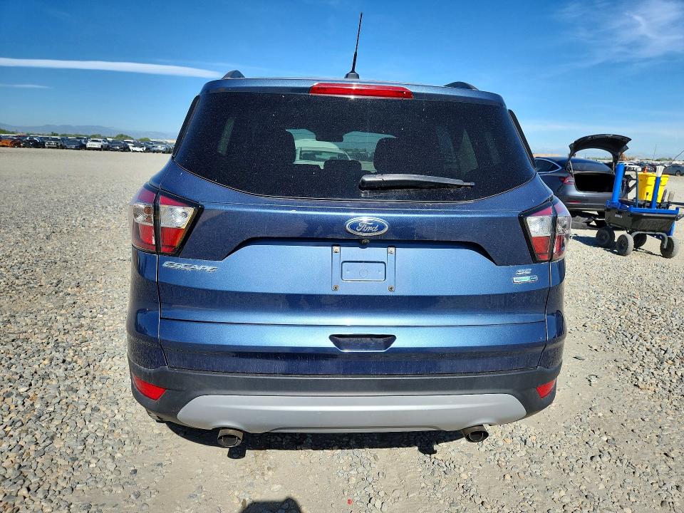 Photo 6 from auction – 2018 FORD ESCAPE with VIN 1FMCU9GD8JUA23241
