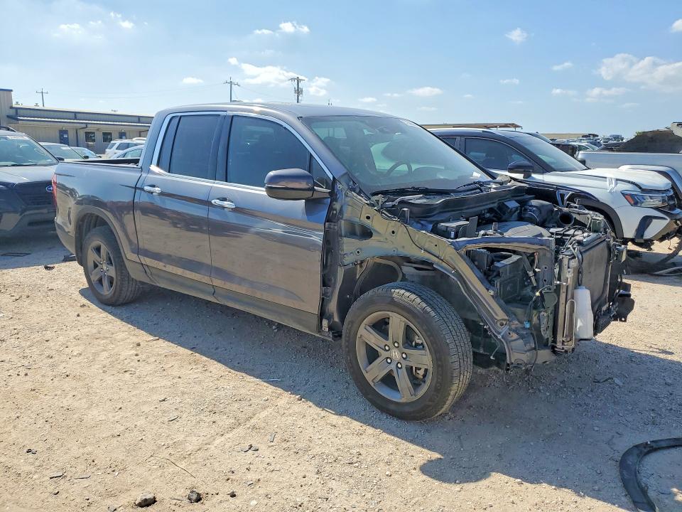 Photo 4 from auction – 2022 HONDA RIDGELINE with VIN 5FPYK3F79NB009430