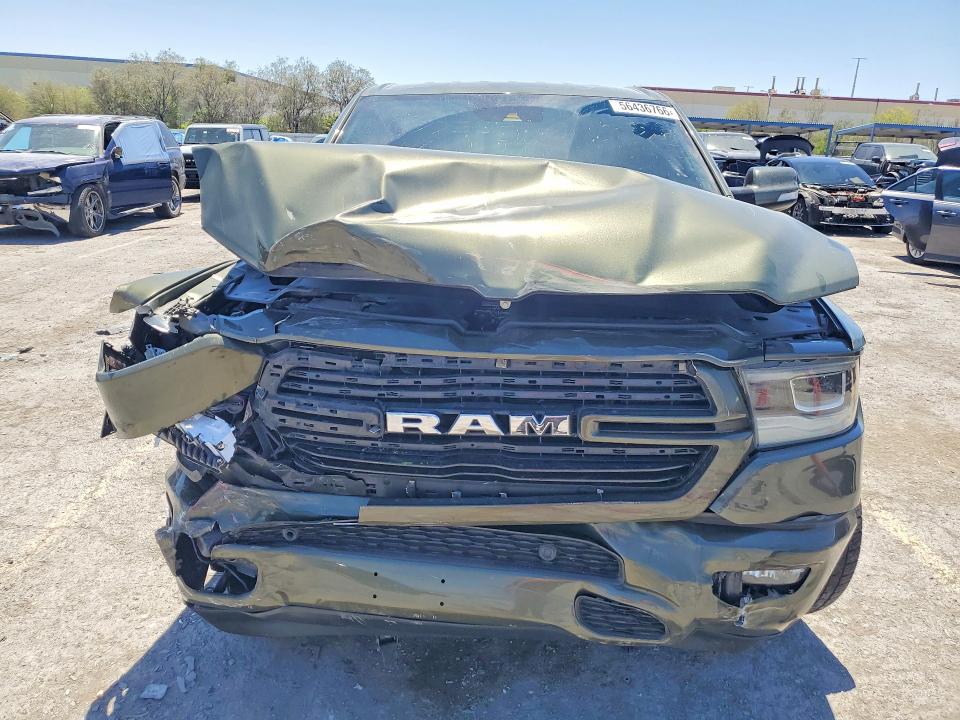 Photo 5 from auction – 2021 RAM 1500 with VIN 1C6RREJT2MN590141