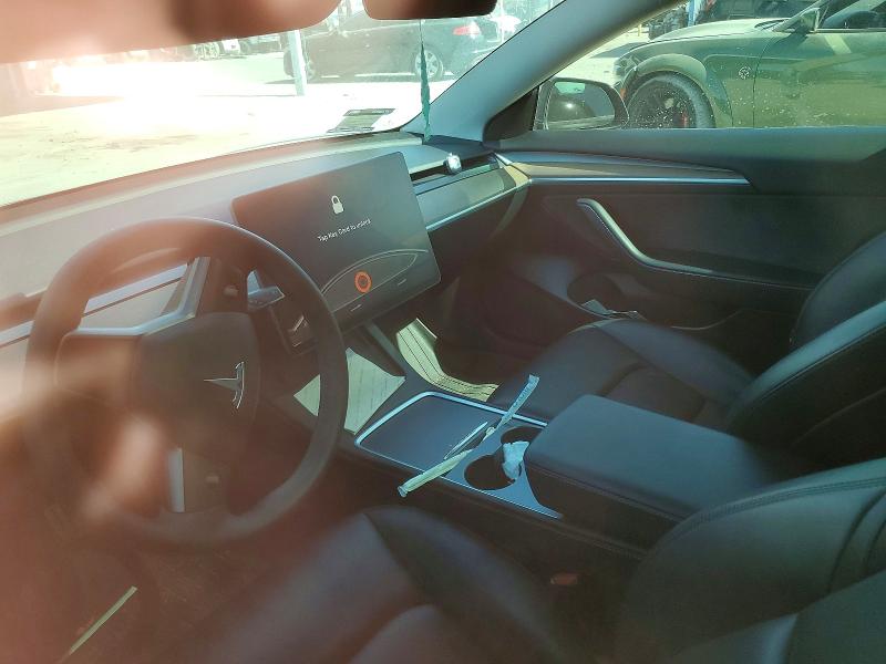 Photo 9 from auction – 2022 TESLA MODEL 3 with VIN 5YJ3E1EC9NF276645