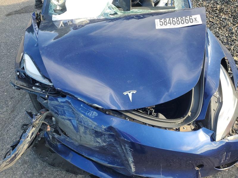 Photo 11 from auction – 2021 TESLA MODEL 3 with VIN 5YJ3E1EB5MF948044