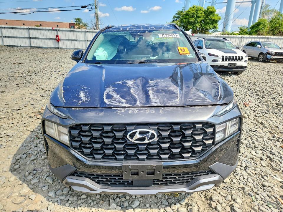 Photo 5 from auction – 2023 HYUNDAI SANTA FE with VIN 5NMS6DAJ1PH624826