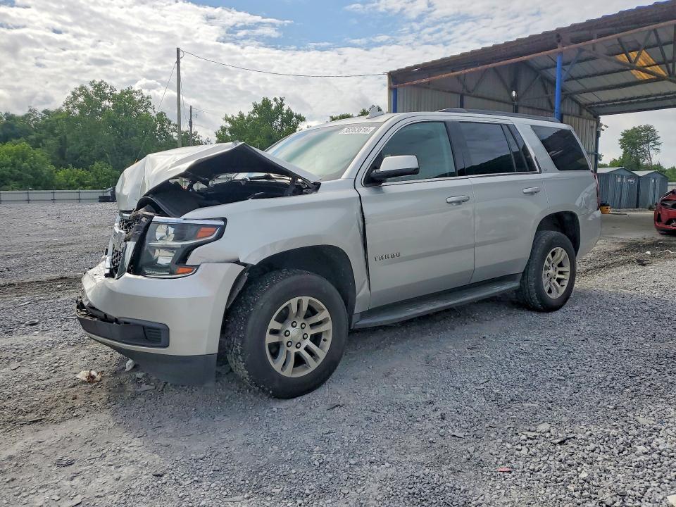 CHEVROLET TAHOE 2019 with VIN 1GNSCBKC2KR409738 - Photo from auction