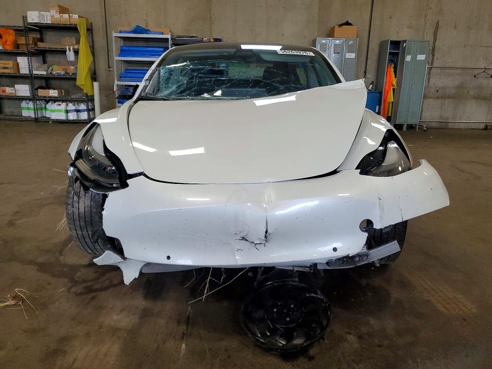 Photo 5 from auction – 2022 TESLA MODEL 3 with VIN 5YJ3E1EB1NF195808