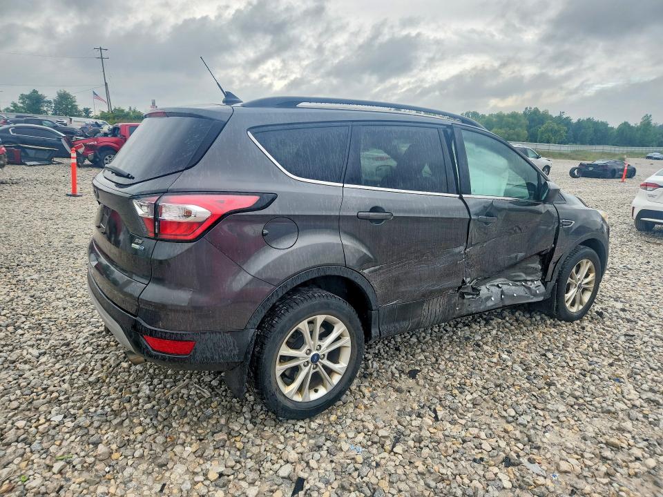 Photo 3 from auction – 2018 FORD ESCAPE with VIN 1FMCU9GD9JUD36038