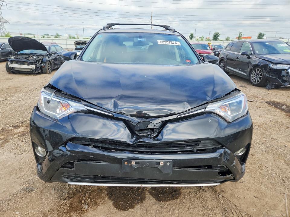 Photo 5 from auction – 2016 TOYOTA RAV4 HV with VIN JTMRJREV0GD002847