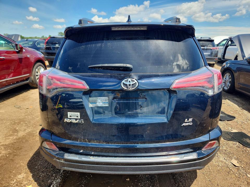 Photo 6 from auction – 2018 TOYOTA RAV4 with VIN JTMBFREV9JJ735829
