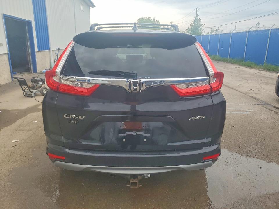 Photo 6 from auction – 2018 HONDA CR-V with VIN 2HKRW2H26JH126648