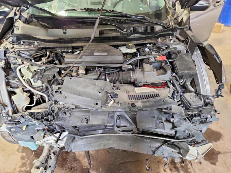 Photo 12 from auction – 2018 HONDA CR-V with VIN 7FARW2H97JE024047