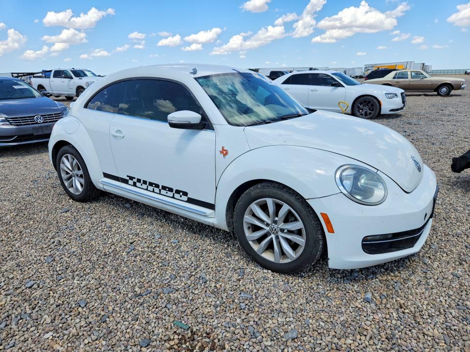 Photo 4 from auction – 2014 VOLKSWAGEN BEETLE with VIN 3VWRL7AT9EM654884