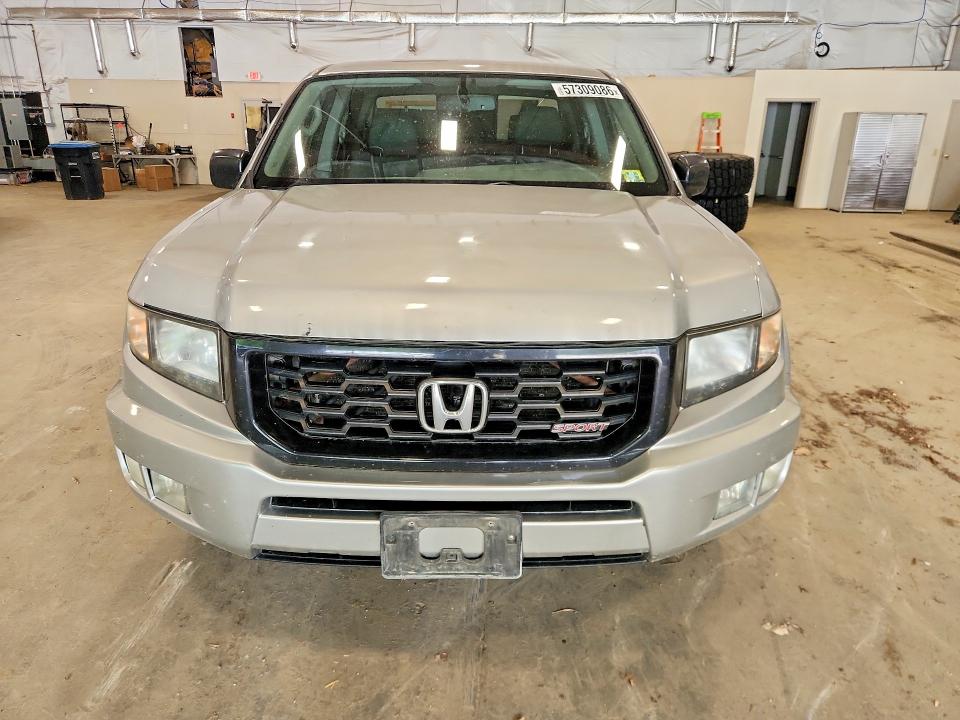 Photo 5 from auction – 2014 HONDA RIDGELINE with VIN 5FPYK1F73EB006415