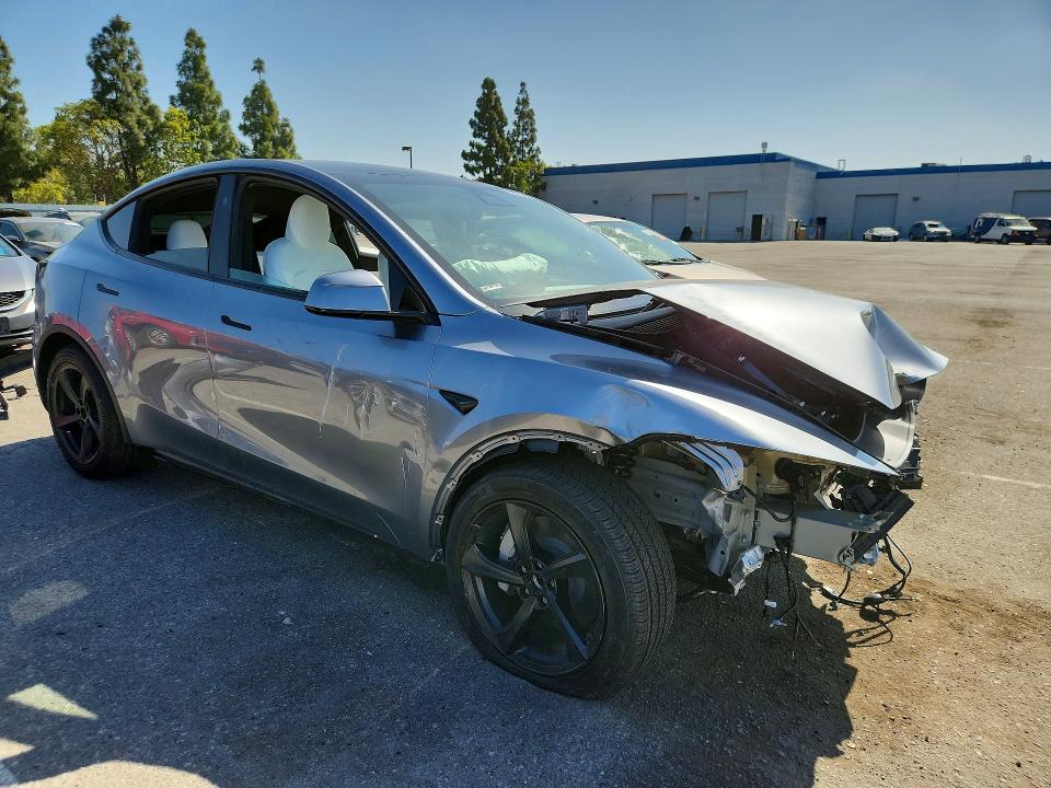 Photo 4 from auction – 2026 TESLA MODEL Y with VIN 7SAYGDED3TF599020
