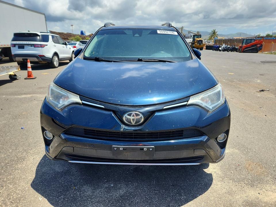 Photo 5 from auction – 2018 TOYOTA RAV4 with VIN 2T3RFREV7JW743623