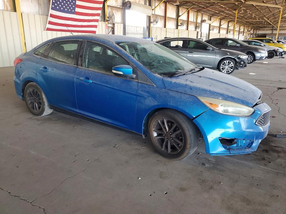 Photo 4 from auction – 2016 FORD FOCUS with VIN 1FADP3F27GL225117