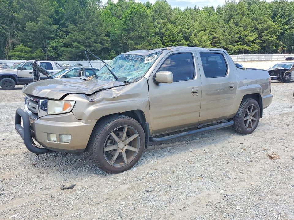 HONDA RIDGELINE 2009 with VIN 5FPYK165X9B109559 - Photo from auction