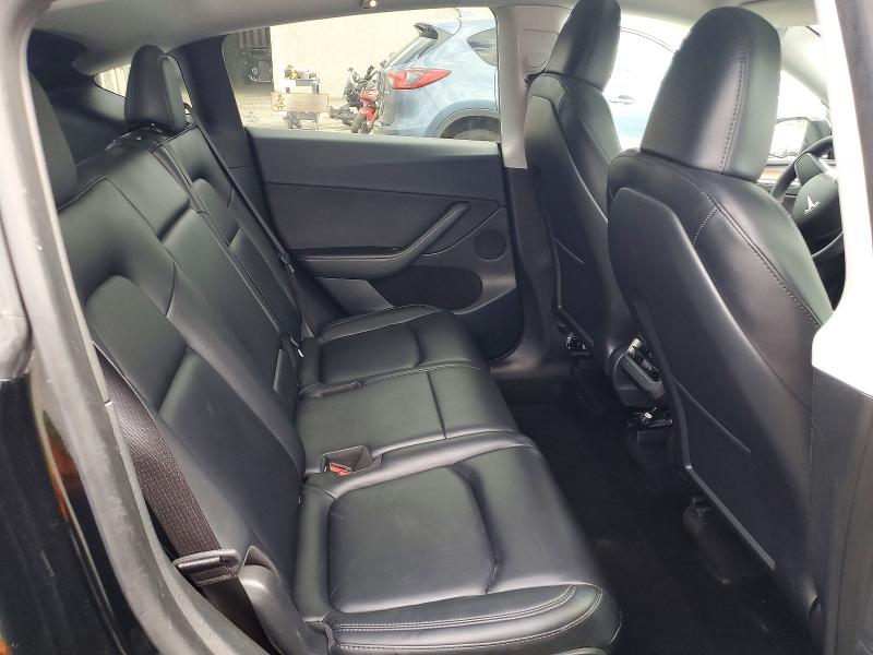 Снимка 11 от търг – 2023 TESLA MODEL Y с VIN 7SAYGAEE2PF694889