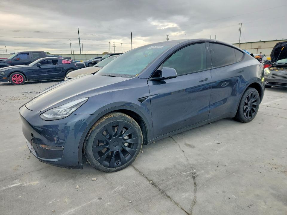 TESLA MODEL Y 2023 with VIN 7SAYGDEE5PA044937 - Photo from auction
