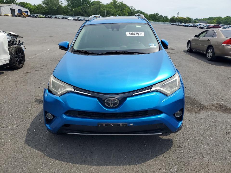Photo 5 from auction – 2018 TOYOTA RAV4 with VIN 2T3WFREV2JW411981