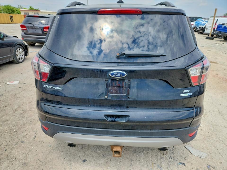 Photo 6 from auction – 2018 FORD ESCAPE with VIN 1FMCU9GD1JUB40210