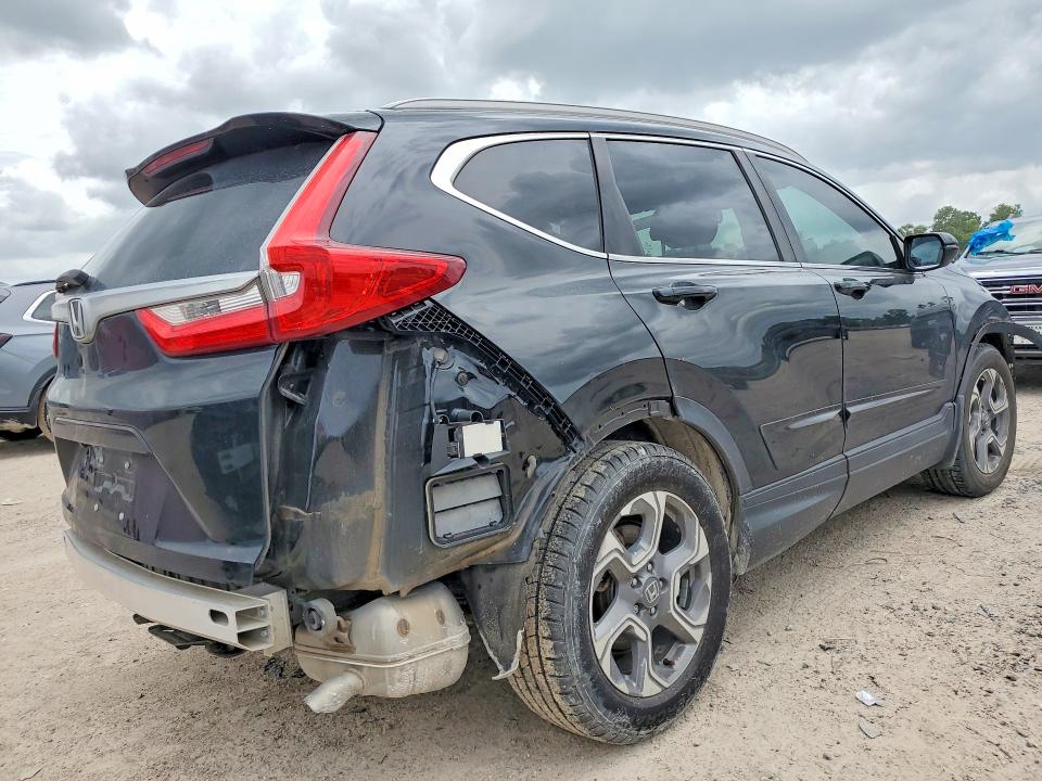 Photo 3 from auction – 2017 HONDA CR-V with VIN 7FARW1H83HE027362