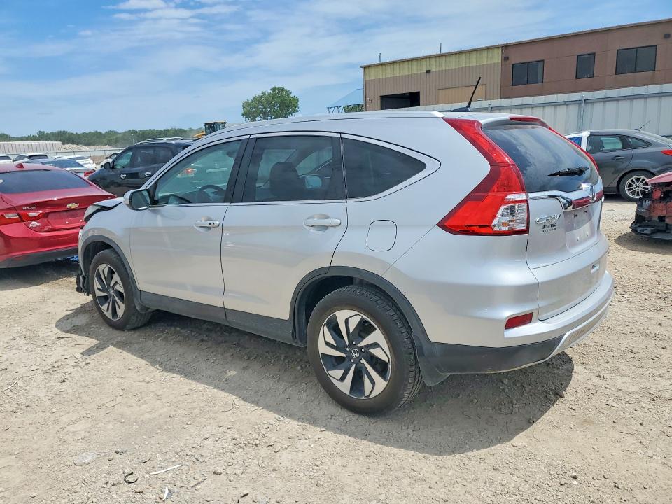 Photo 2 from auction – 2016 HONDA CR-V with VIN 5J6RM4H99GL101028