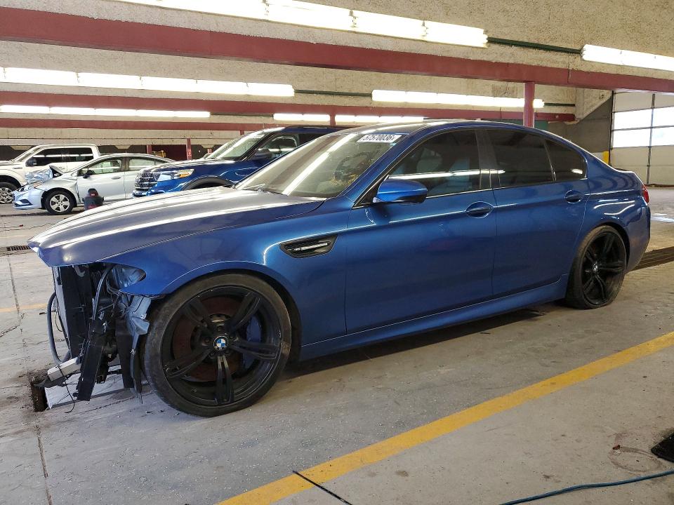 BMW M5 2013 with VIN WBSFV9C56DD095999 - Photo from auction