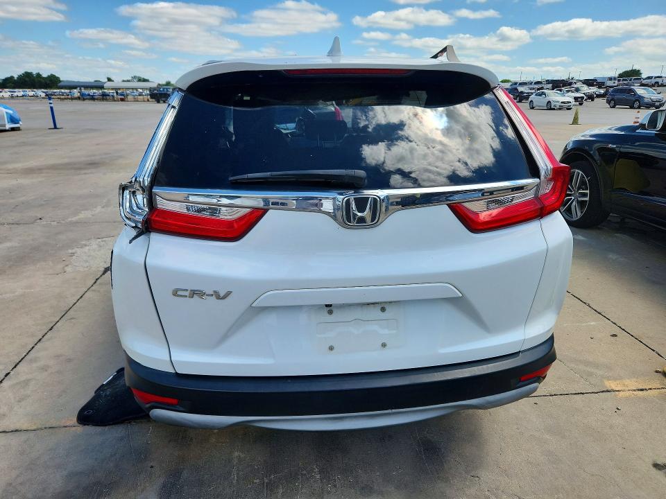 Photo 6 from auction – 2019 HONDA CR-V with VIN 7FARW1H80KE026175