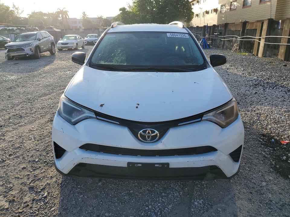 Photo 5 from auction – 2016 TOYOTA RAV4 with VIN JTMZFREV1GD090972
