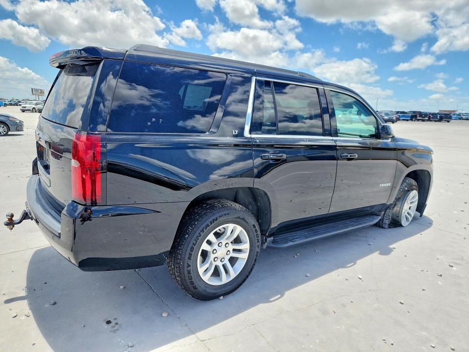 Photo 3 from auction – 2019 CHEVROLET TAHOE with VIN 1GNSKBKC7KR350950