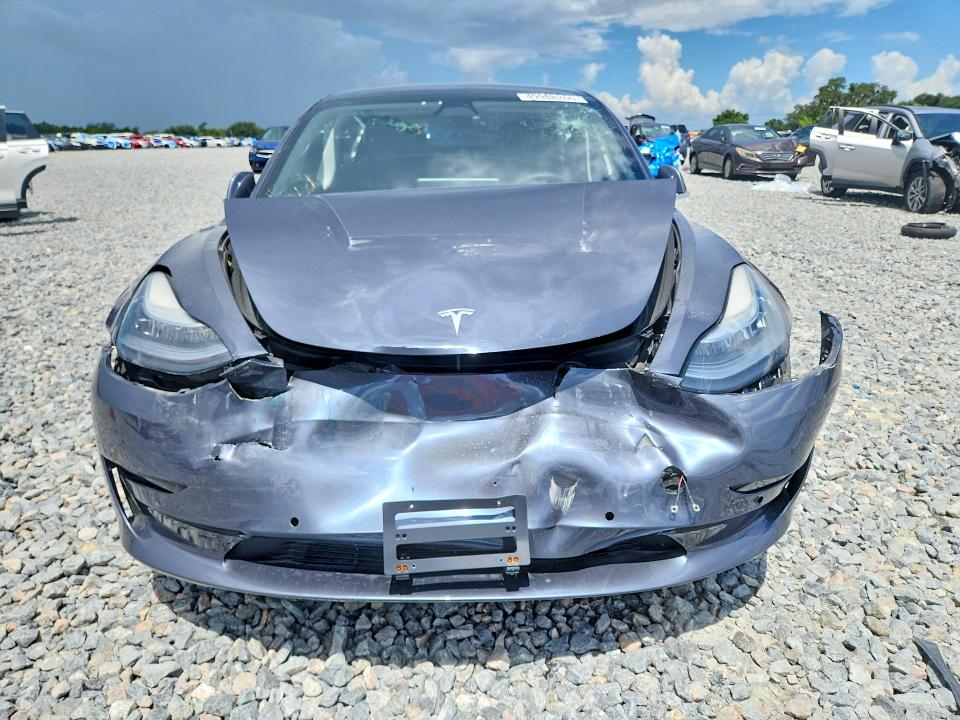 Photo 5 from auction – 2020 TESLA MODEL 3 with VIN 5YJ3E1EC2LF713513