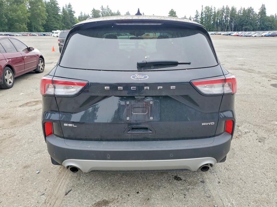 Photo 6 from auction – 2021 FORD ESCAPE with VIN 1FMCU9H68MUA87686
