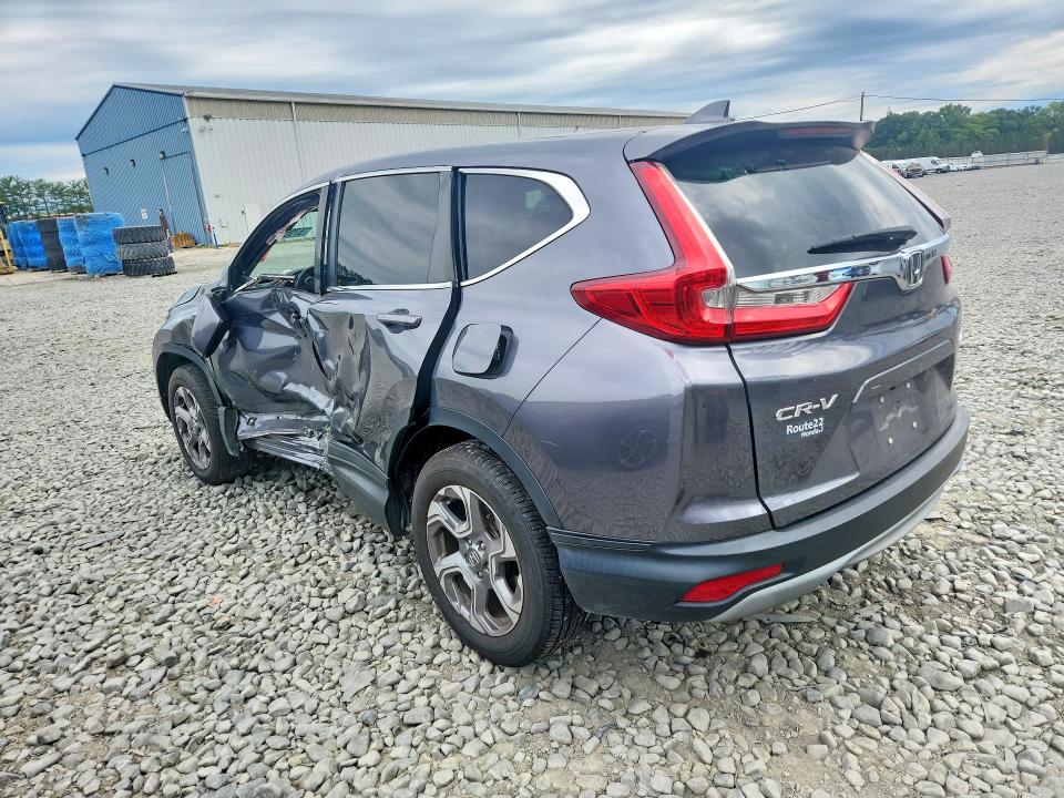 Photo 2 from auction – 2018 HONDA CR-V with VIN 2HKRW2H80JH675265
