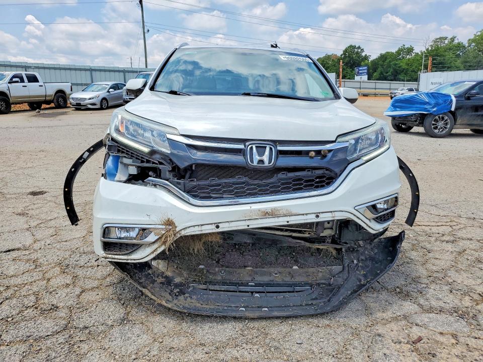 Photo 5 from auction – 2016 HONDA CR-V with VIN 5J6RM4H72GL063527