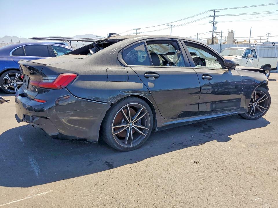 Photo 3 from auction – 2021 BMW M340I with VIN 3MW5U7J04M8B65835