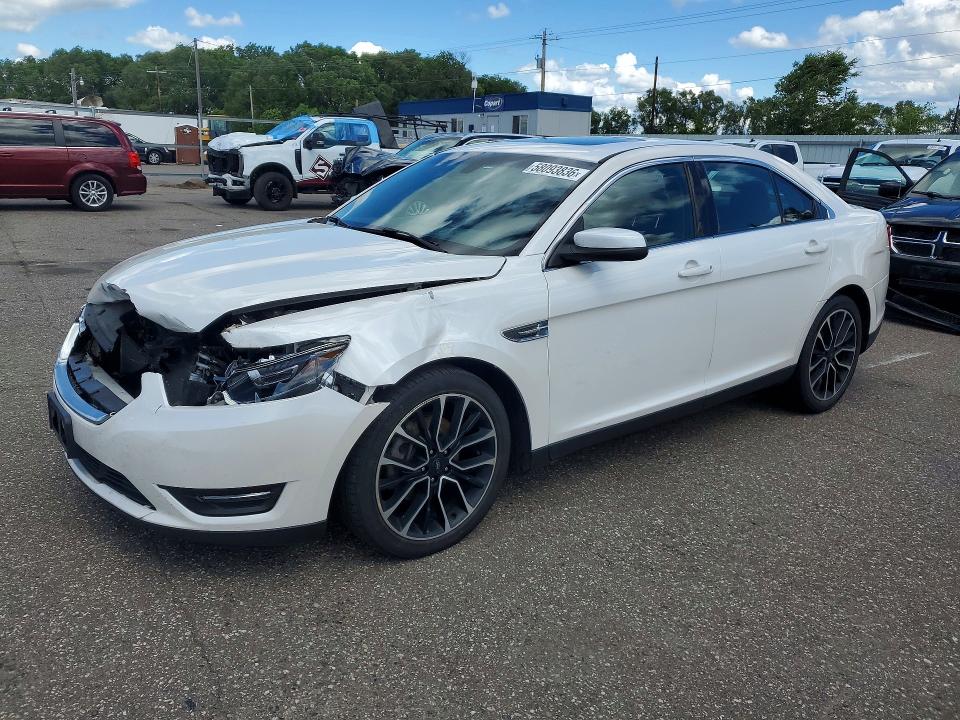 FORD TAURUS 2017 with VIN 1FAHP2E88HG126012 - Photo from auction