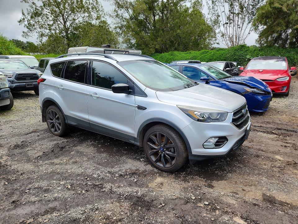 Photo 4 from auction – 2019 FORD ESCAPE with VIN 1FMCU9GD3KUA07532