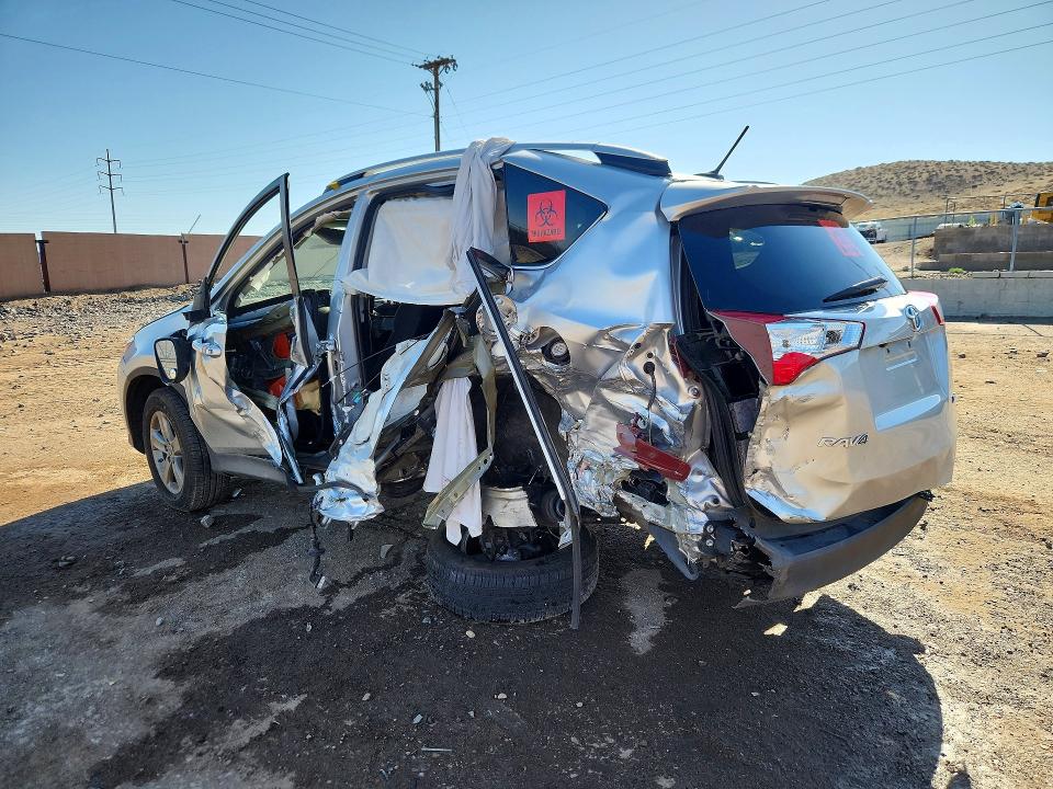 Photo 2 from auction – 2014 TOYOTA RAV4 with VIN 2T3WFREV8EW129401