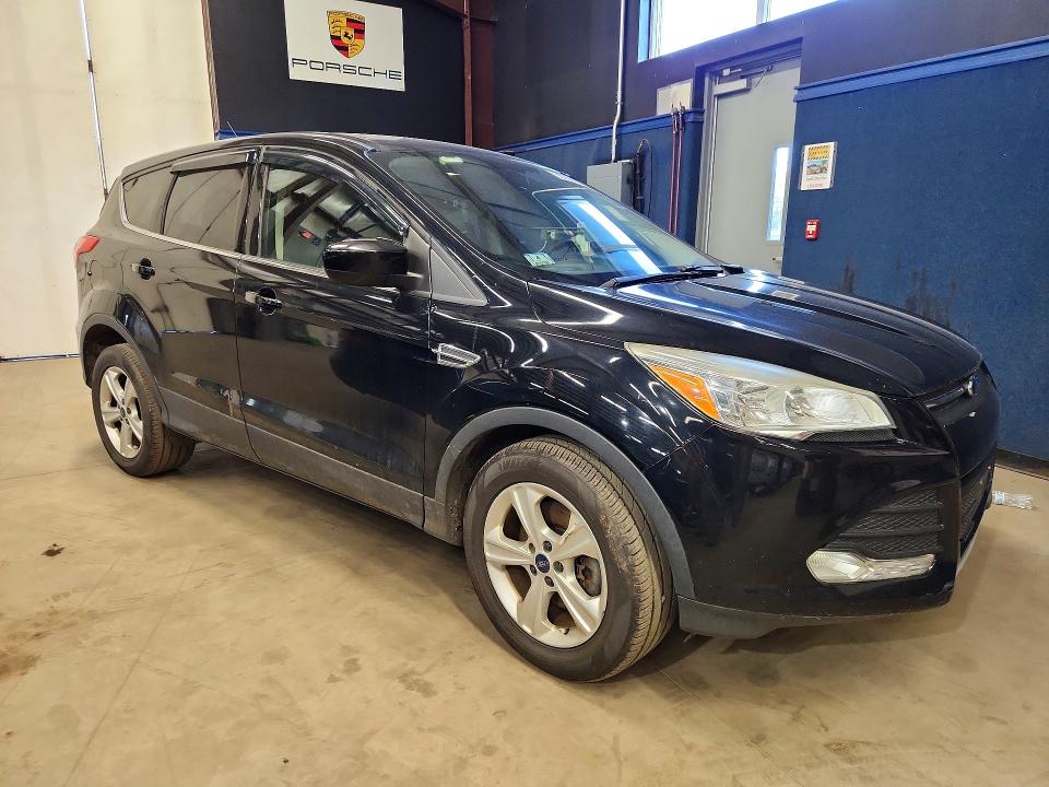 Photo 4 from auction – 2016 FORD ESCAPE with VIN 1FMCU9GX6GUA06473