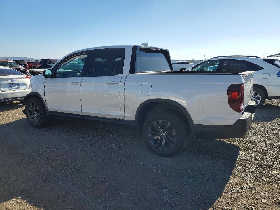 Photo 2 from auction – 2023 HONDA RIDGELINE with VIN 5FPYK3F11PB032148