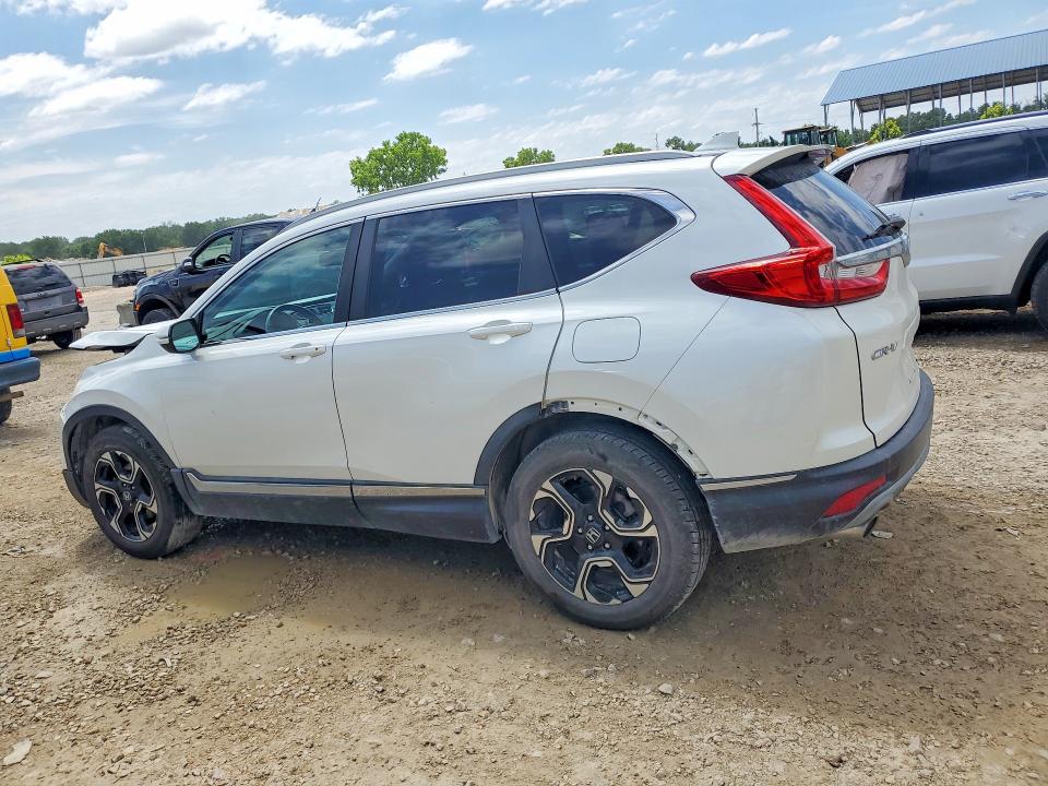 Photo 2 from auction – 2017 HONDA CR-V with VIN 5J6RW2H93HL050478