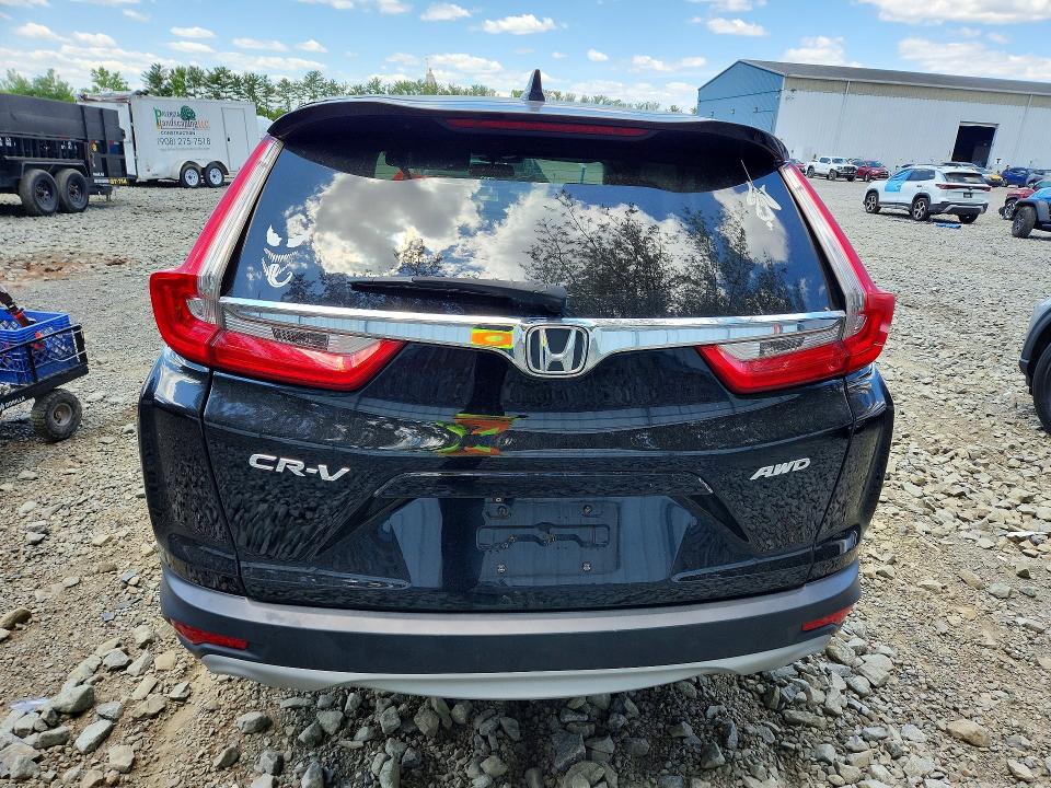 Photo 6 from auction – 2019 HONDA CR-V with VIN 7FARW2H56KE048189