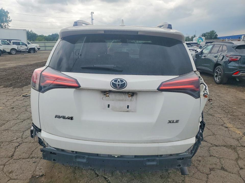 Photo 6 from auction – 2018 TOYOTA RAV4 with VIN 2T3WFREV6JW517513