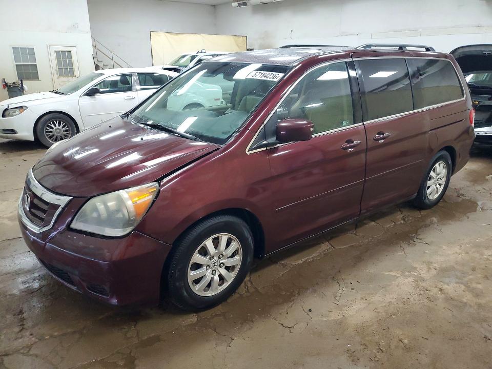 HONDA ODYSSEY 2010 with VIN 5FNRL3H7XAB100918 - Photo from auction