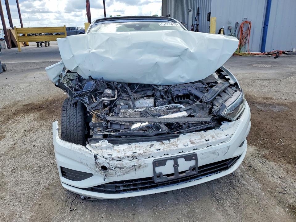 Photo 5 from auction – 2021 VOLKSWAGEN JETTA with VIN 3VWE57BU6MM085152