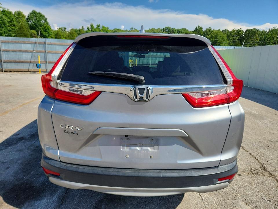 Photo 6 from auction – 2018 HONDA CR-V with VIN 5J6RW1H58JA009305