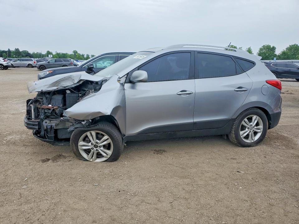 HYUNDAI TUCSON 2012 with VIN KM8JUCAC5CU459701 - Photo from auction